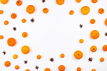Flatlay with various citrus fruits: tangerines, kumquat etc on white. Square image