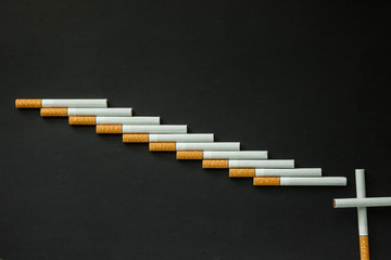 Cigarette on a dark background. quit Smoking