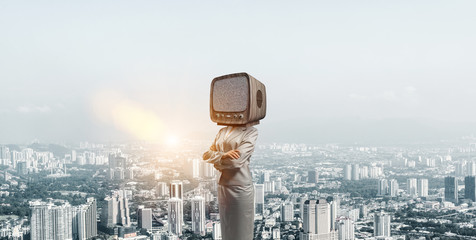 Business woman with old TV instead of head.