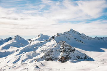 Fototapeta na wymiar snow-capped peaks of the mountains of the Caucasian ridge