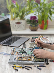 soldering and repair of computer monitor. 