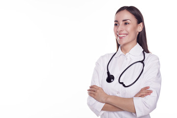 Fototapeta premium Smiling medical woman doctor. Isolated over white background