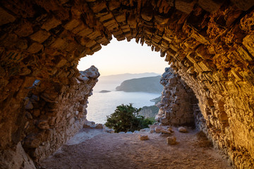 View from ruins of a church in Monolithos castle at sunset
