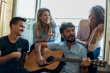 Playing guitar with my friends