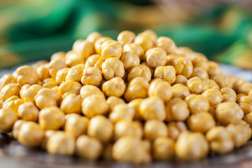 Chickpeas fried in a pan.Oriental dessert.Selective focus.