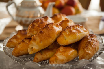 Homemade pies with apples in the vase. © Vladimir