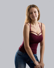 Fototapeta premium Attractive beautiful girl posing in studio