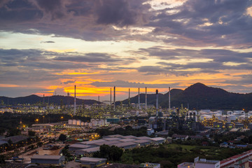 Beautiful sunset  petrochemical oil refinery factory plant cityscape of Chonburi province at night  , landscape Thailand