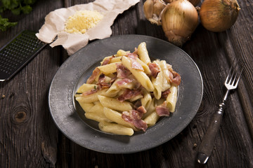 Pasta with cheese sauce and bacon