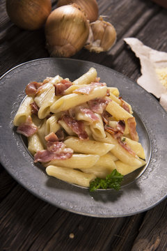 Pasta with cheese sauce and bacon