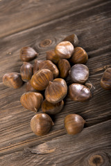 Chestnuts on wooden background