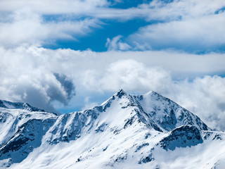 Fototapeta na wymiar Italian Alps around Maso Corto. Beautiful view of the mountains in winter in a popular ski resort.