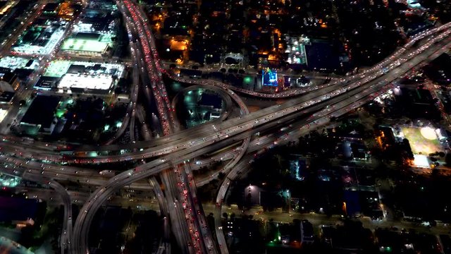 Aerial view of the 110 and 10 highway intersection in Downtown Los Angeles in 4K from a helicopter