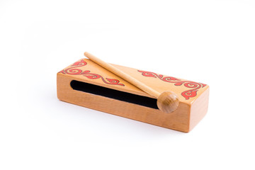 Kazakh traditional woodblock. 
Closeup of a woodblock and a mallet with kazakh traditional...