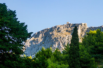 Fototapeta na wymiar View of the castle at the top of the mountain, Croatia