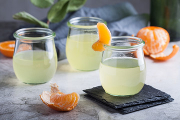 Fototapeta na wymiar Mandarin and lemon cocktail in jar