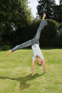 Woman cartwheeling