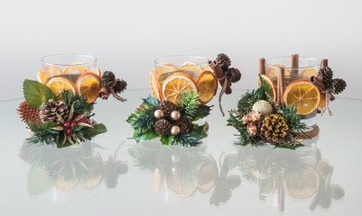 Decorative handmade candle holders on the Christmas table