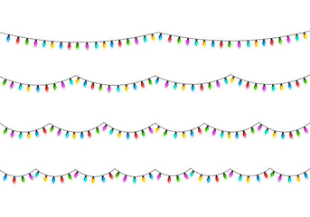 Christmas glowing lights on white background. Garlands with colored bulbs. Xmas holidays. Christmas greeting card design element. New year,winter.