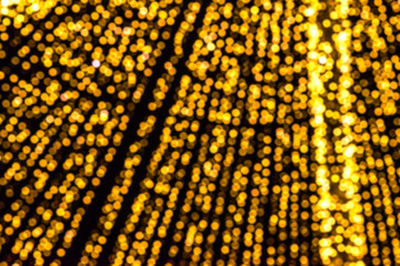 Abstract, colorful, blurry christmas background. Glowing and sparkling lights during night