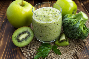 Vegetarian smoothie on the rustic wooden background