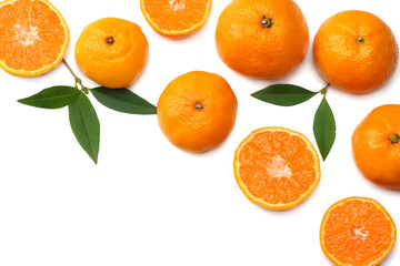 mandarin with slices and green leaf isolated on white background top view