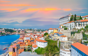 Cityscape panorama of Porto in sunset light, traditional architecture near Douro river in Portugal - obrazy, fototapety, plakaty