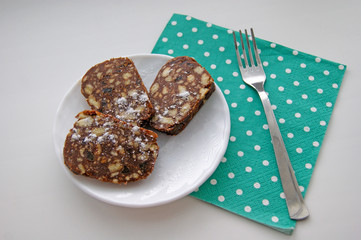 Chocolate sausage with biscuits and raisins