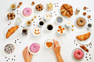 White background with woman's hand and different types of coffee and desserts to them