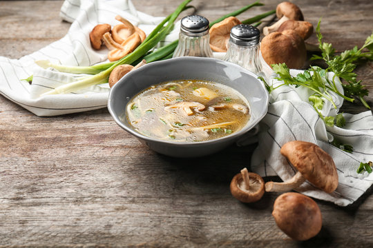 Bowl Of Delicious Shiitake Mushroom Soup On Table