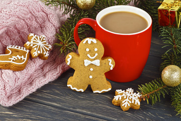 Christmas composition on vintage wooden table background - Cup of hot cocoa with gingerbread cookie.