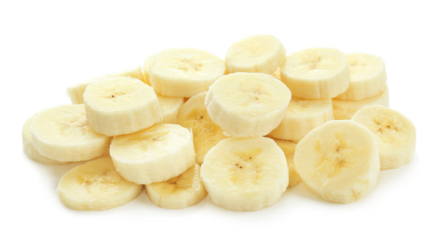 Pieces of tasty ripe banana on white background