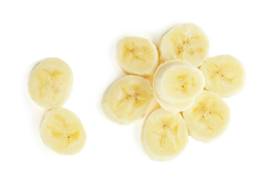 Pieces of tasty ripe banana on white background