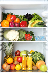 Open fridge full of vegetables and fruits © 5second