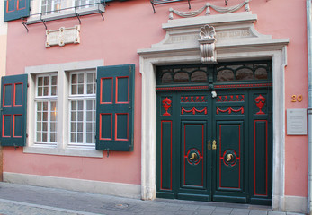 BONN, GERMANY - NOVEMBER 2015: Facade with entrance to the birth house of Ludwig von Beethoven in November 2015 in Bonn. Beethoven-Haus is where the composer was born in 1770, and now serves as museum - obrazy, fototapety, plakaty