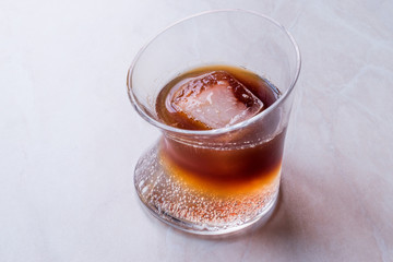 Espresso Tonic with ice in Glass.