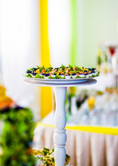 The egg whitefish is filled with red and black caviar