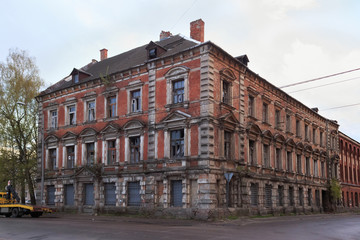 Fototapeta na wymiar View of the old abandoned building in the center of Kaliningrad (former german town Konigsberg). At the end of World War II in 1945, the city became part of the Soviet Union. Now is russian exclave.