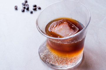 Espresso Tonic with ice in Glass.