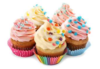 Tasty cupcakes on white background