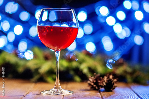 A Glass Of Burgundy Wine Concept Of Happy Christmas New