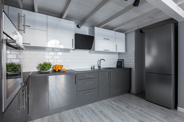 Modern kitchen with wooden ceiling