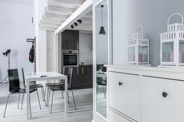 Lanterns on white cabinet