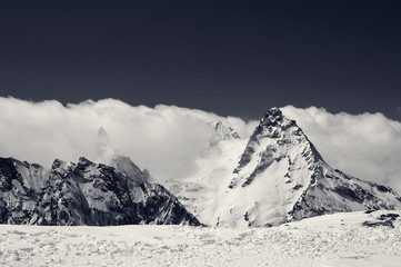 Black and white snowy mountains at sun day