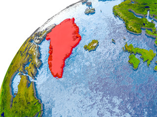 Map of Greenland in red on globe