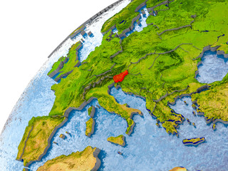 Map of Slovenia in red on globe