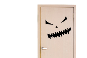 Door with black angry scary monster face.  Concept of phobia or fear
