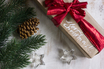 Fototapeta na wymiar Christmas gift boxes with fir branch