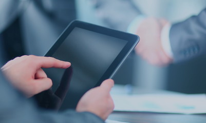 Businessman holding digital tablet