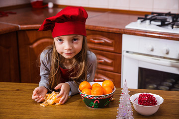 festive red apron Christmas party dinner dessert peppermint cupcakes cheese cream sugar sprinkling decoration girl new year red apron chef chief confectioner